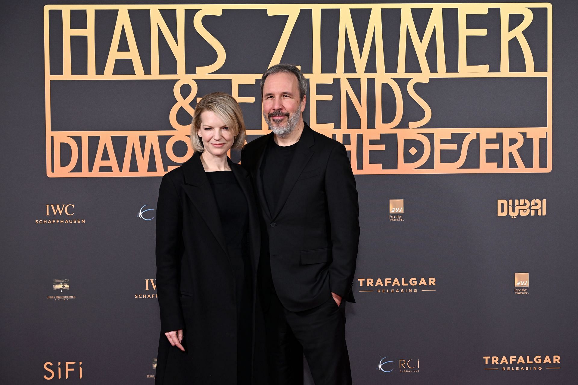 Denis Villeneuve and his wife Tanya Lapointe as seen at the Hans Zimmer & Friends: Diamond In The Desert special movie preview in March 2025 (Image via Getty)